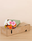 Blumenstrauss sicher verpackt in Flori-Versandbox