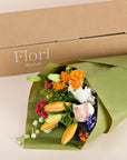Blumenstrauss sicher verpackt in Flori-Versandbox